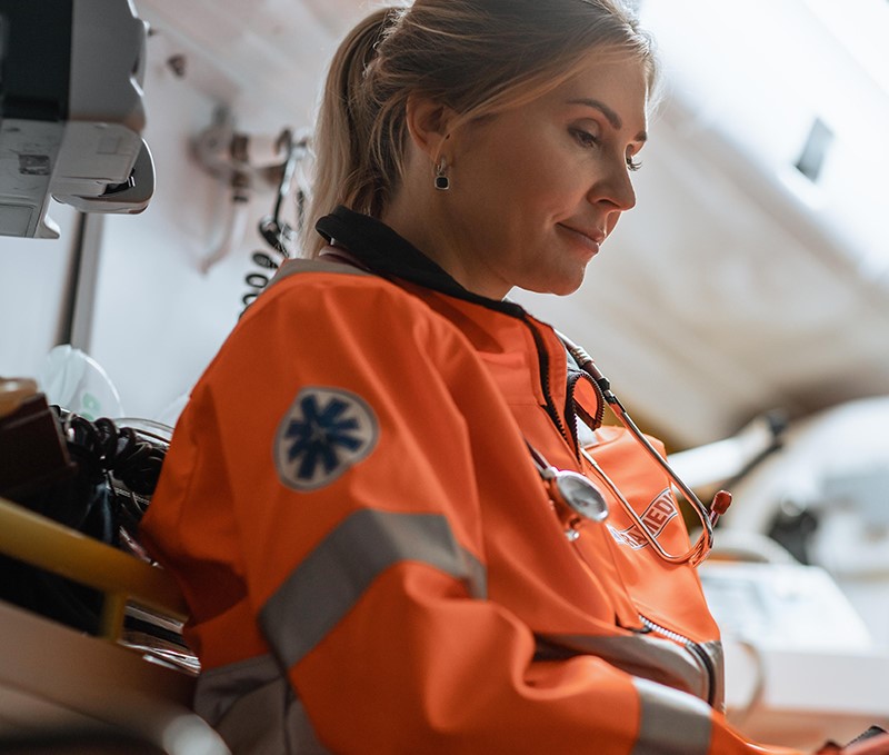 lady in orange emergency coat